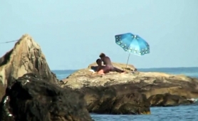 beach-voyeur-finds-a-lustful-amateur-couple-having-hot-sex