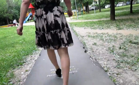 crossdresser-in-stockings-goes-out-for-a-walk-with-camera